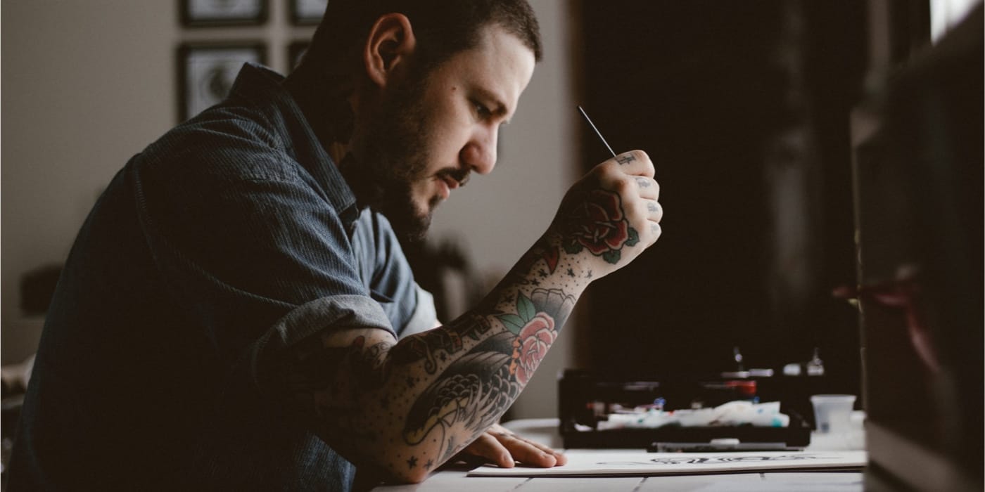 Freelancer with tattoos