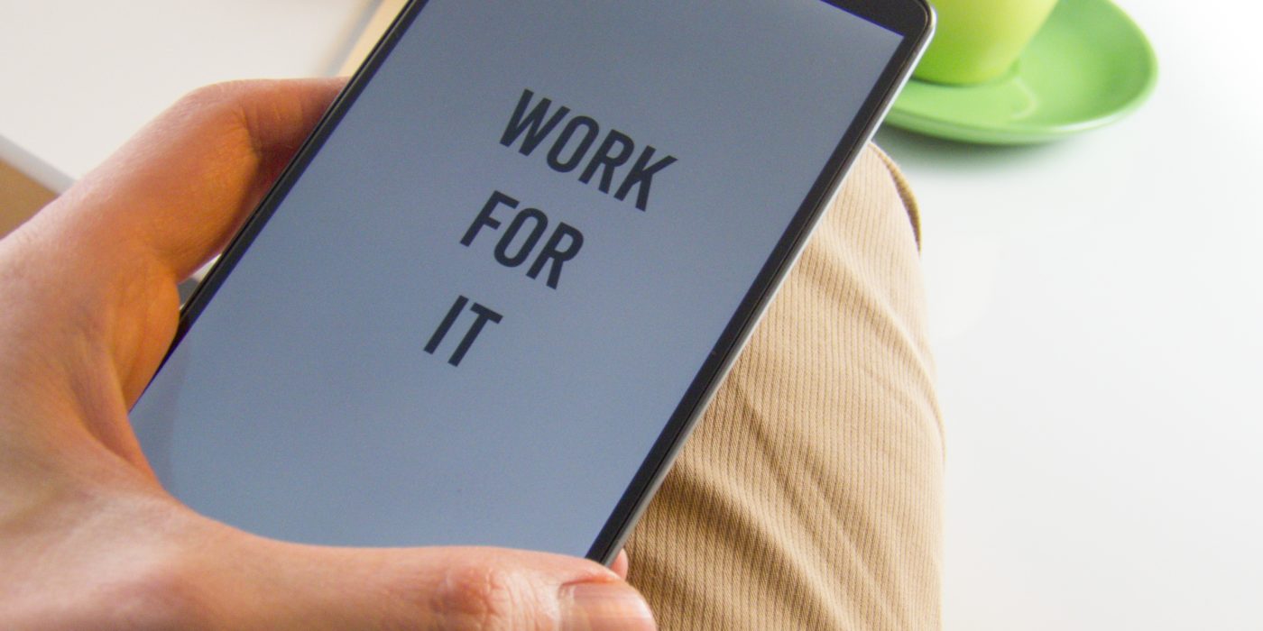 Work for It slogan on a tablet